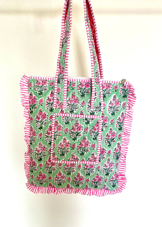 Gewatteerde laptoptas met volant groen/roze