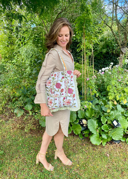 Gewatteerde laptoptas met volant bloementuin