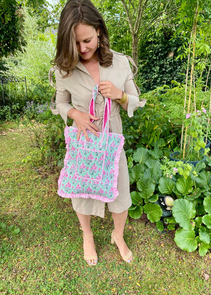 Gewatteerde laptoptas met volant groen/roze