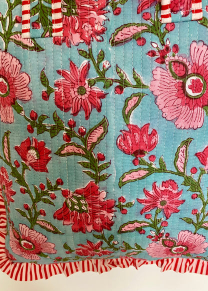 Gewatteerde laptoptas met volant blauw/roze